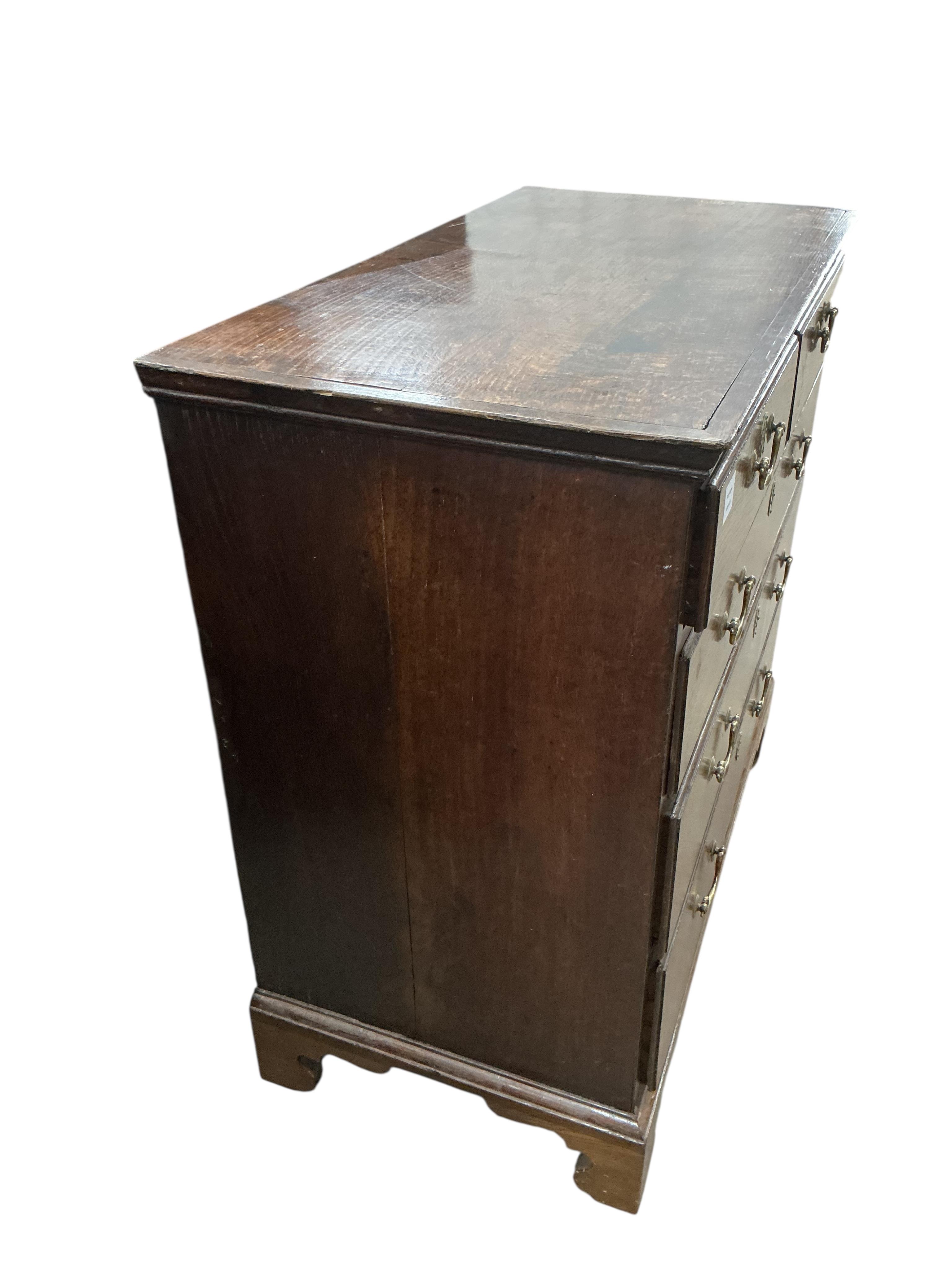 A George III oak chest of drawers, width 94cm, depth 49cm, height 91cm